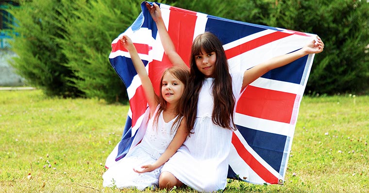 two-girls-children-uk-flag